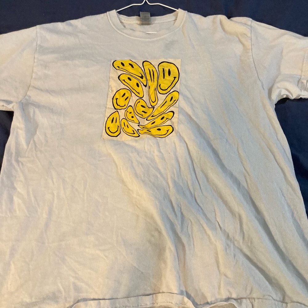 Warped smiley face shirt
